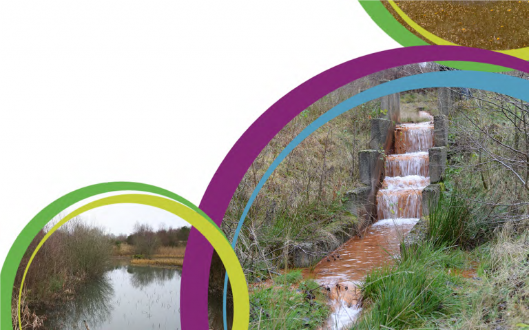 Flooded mine water outflow stained orange with iron, beside a settlement pond