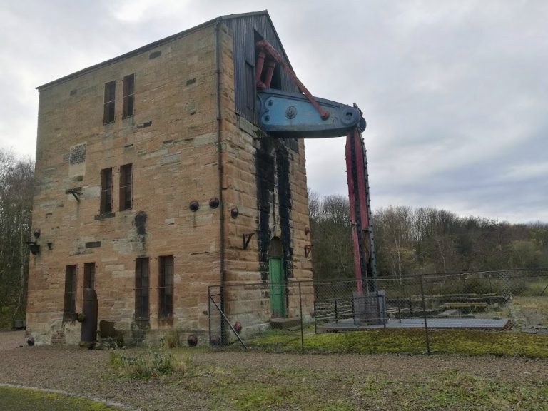 Sandstone engine house and Cornish beam engine at Prestongrange Industrial Heritage Museum