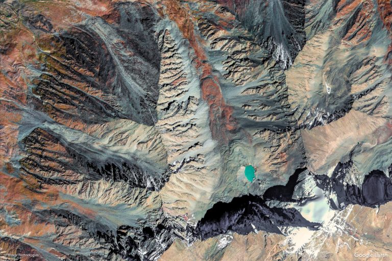 Satellite image of steep mountain valleys of the type used in TownRock's SAR exploration work