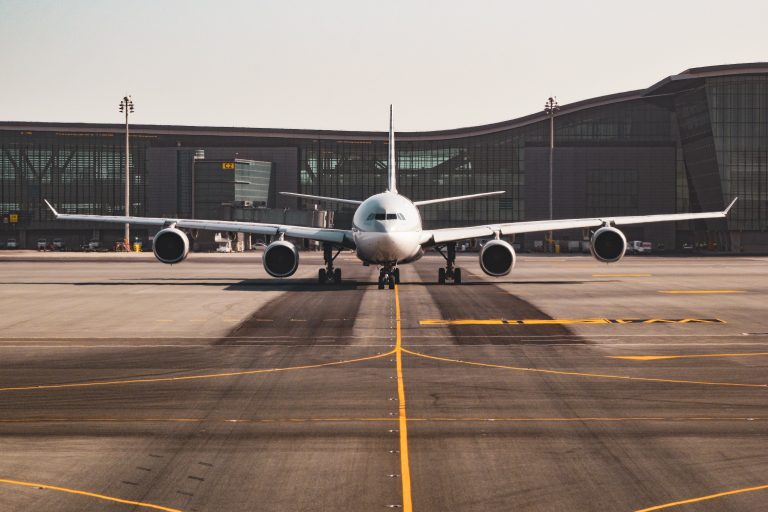 Passenger aircraft parked at an airport terminal gate