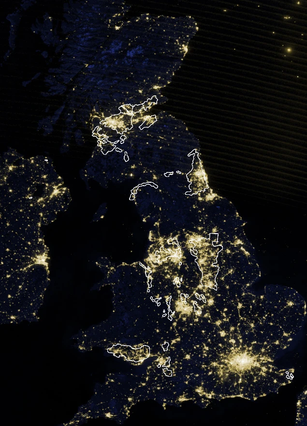 Satellite image of the UK at night with the UK coalfields outlined in white